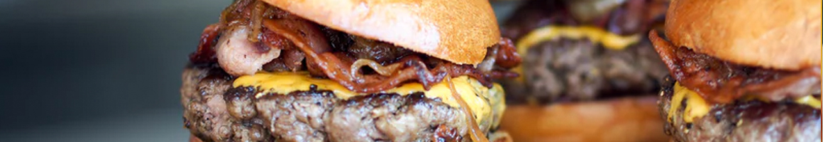 Eating American (Traditional) Burger Diner Fast Food at The Spot Drive-In restaurant in Kenosha, WI.